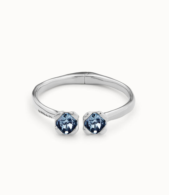 Sterling silver-plated bangle bracelet with inner spring and two blue crystals