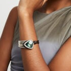 Bangle bracelet with leather and green crystal