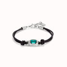 Leather bracelet with a green crystal