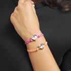 Pink elastic thread bracelet with heart charm