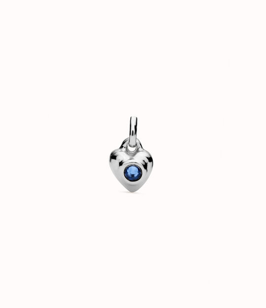 Sterling silver-plated charm with blue crystal.