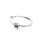 White leather bracelet with butterfly ornament
