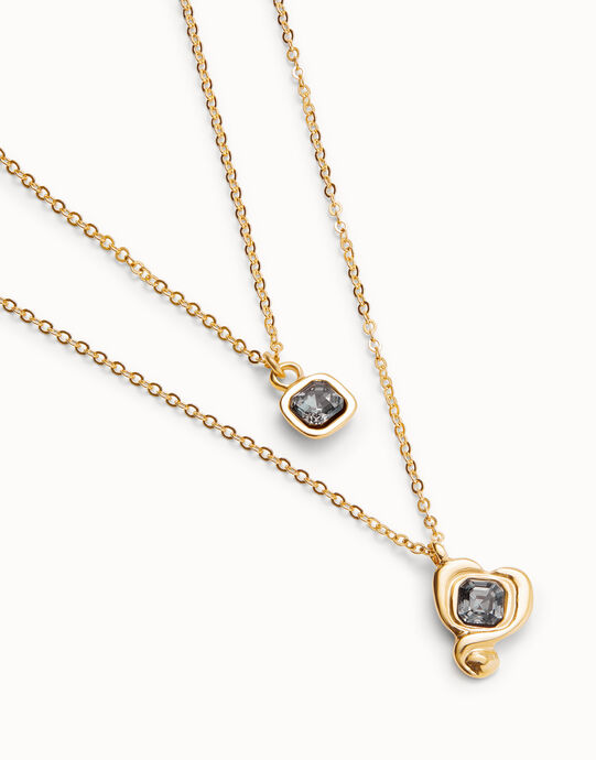 Colgante ba&ntilde;ado en oro 18k con doble cadena  y corazones con cristal negro