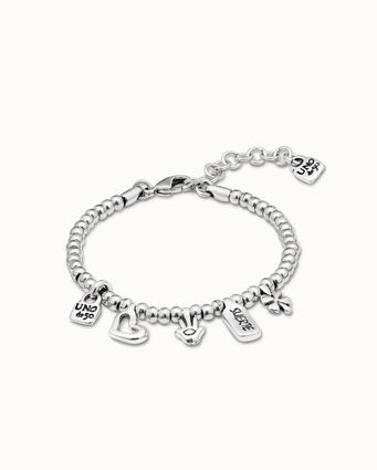 Pulsera bañada en plata de ley con charm corazón, trébol y mano