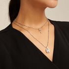 Colgante de plata con 2 cadenas y charms de llave y candado