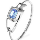 Semi-rigid bracelet with blue faceted crystal