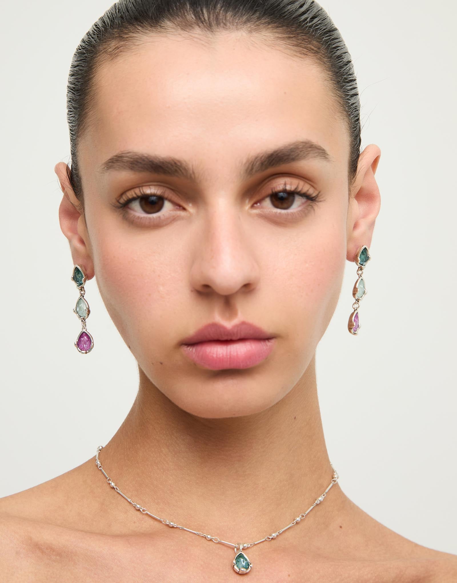 Long earrings with three multicoloured drop-shaped faceted crystals