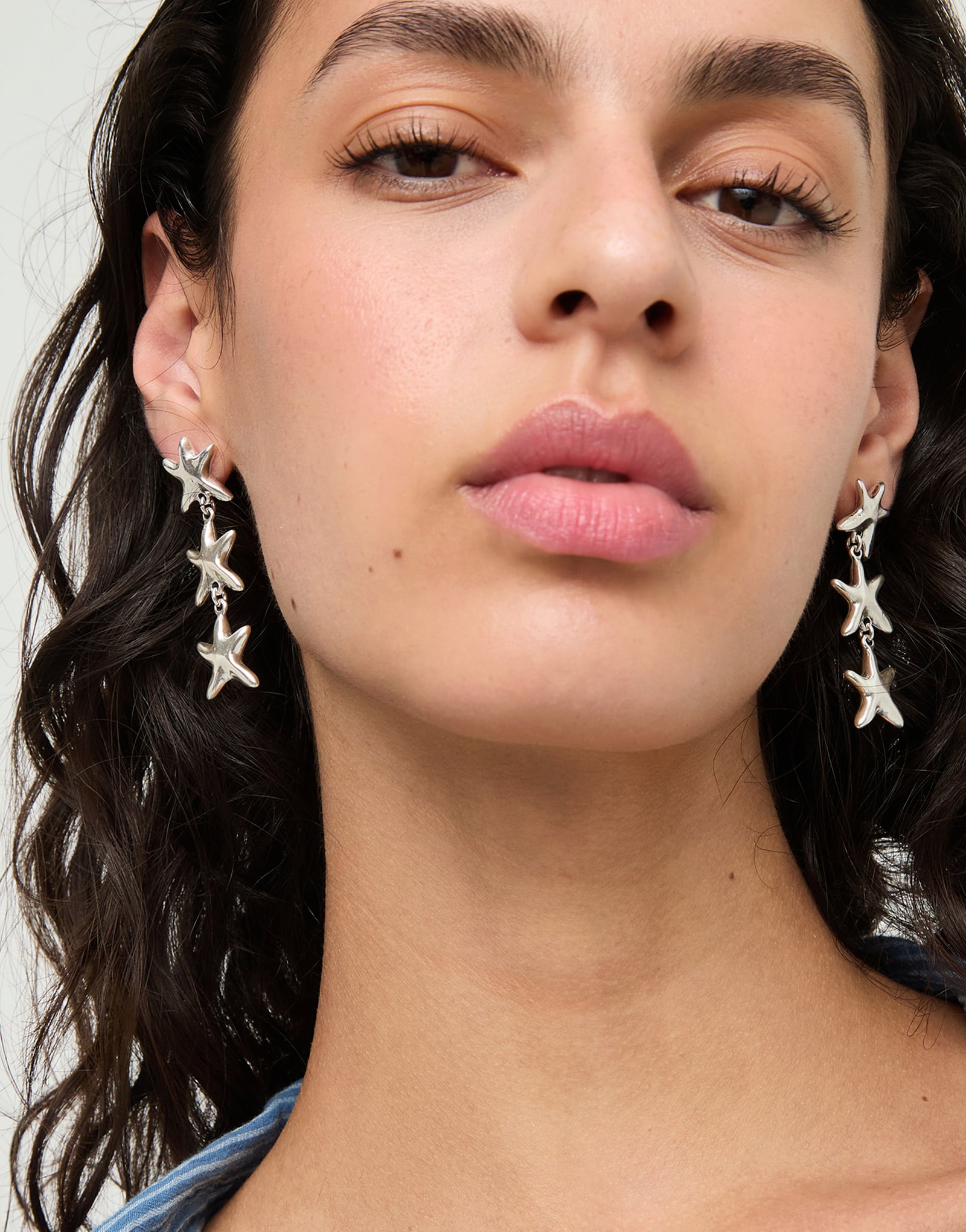 Long earrings with 3 starfishes