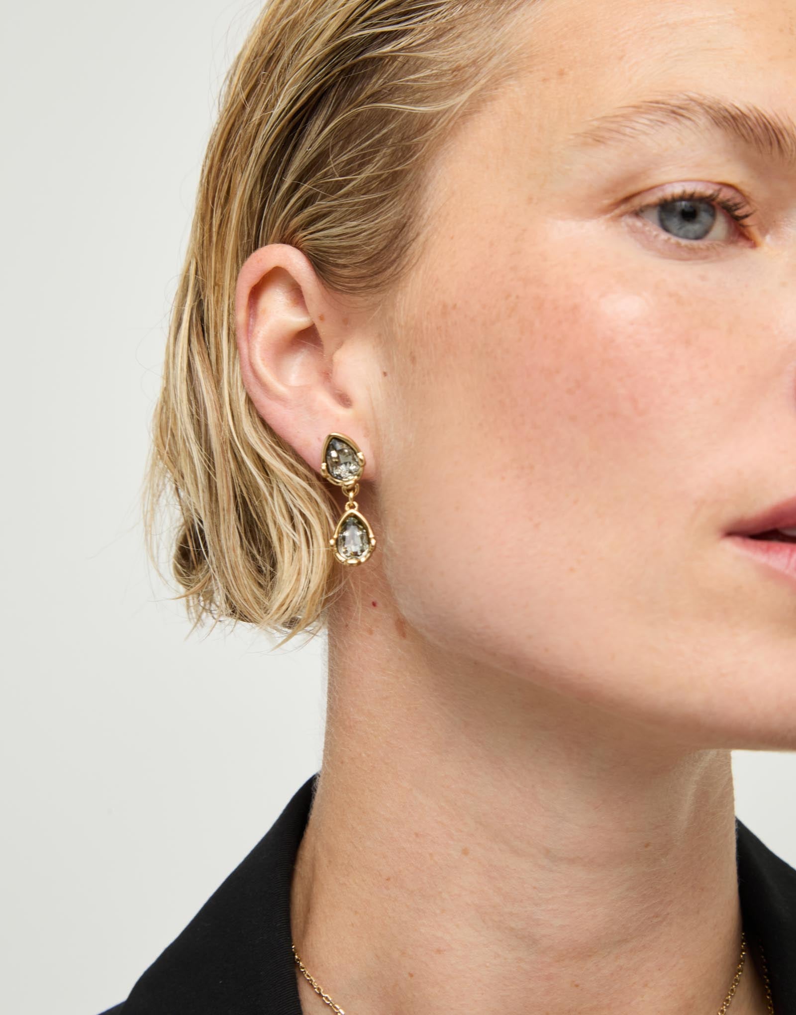 Long  earrings with two grey drop-shaped faceted crystals