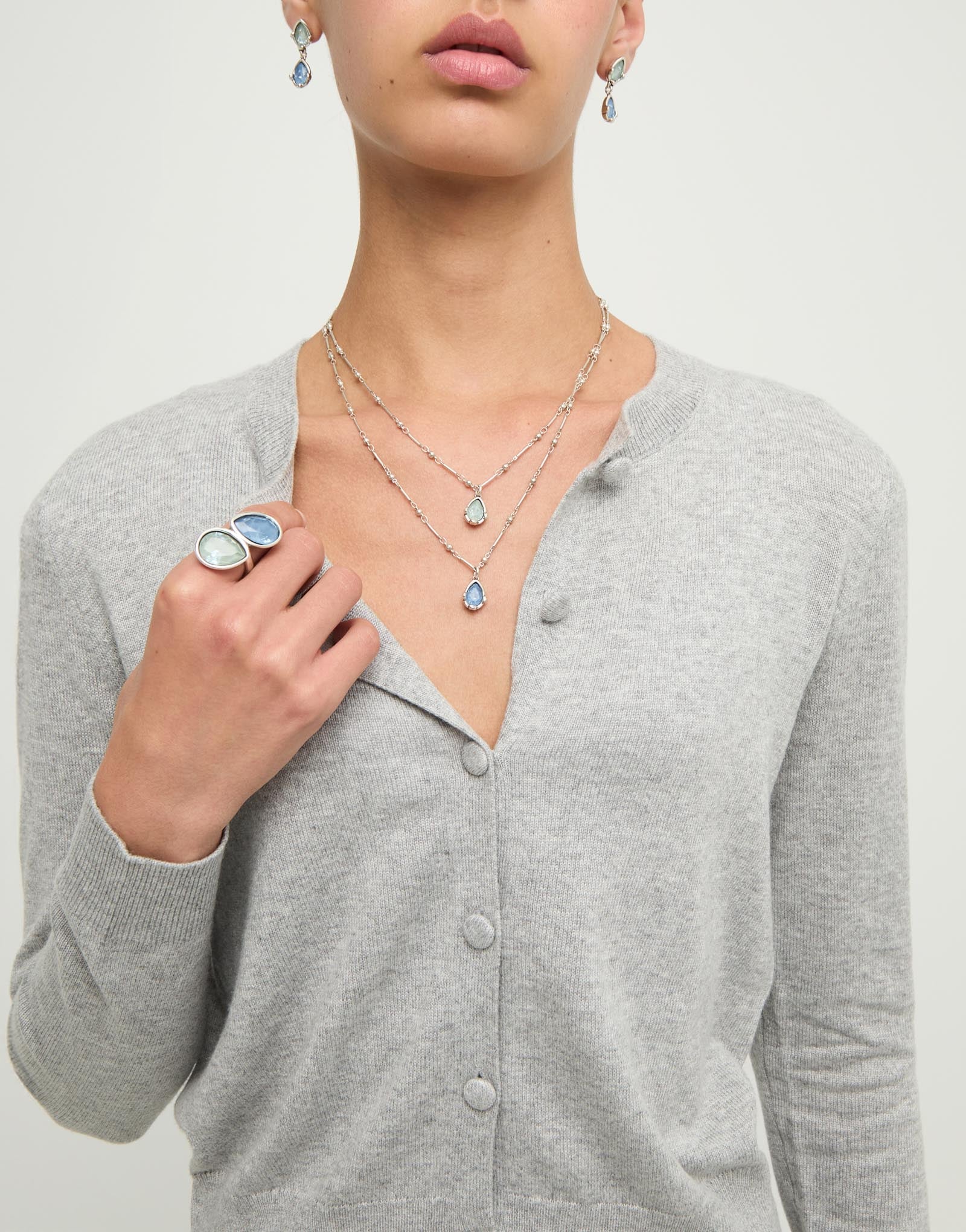 Double necklace with two blue drop-shaped faceted crystals