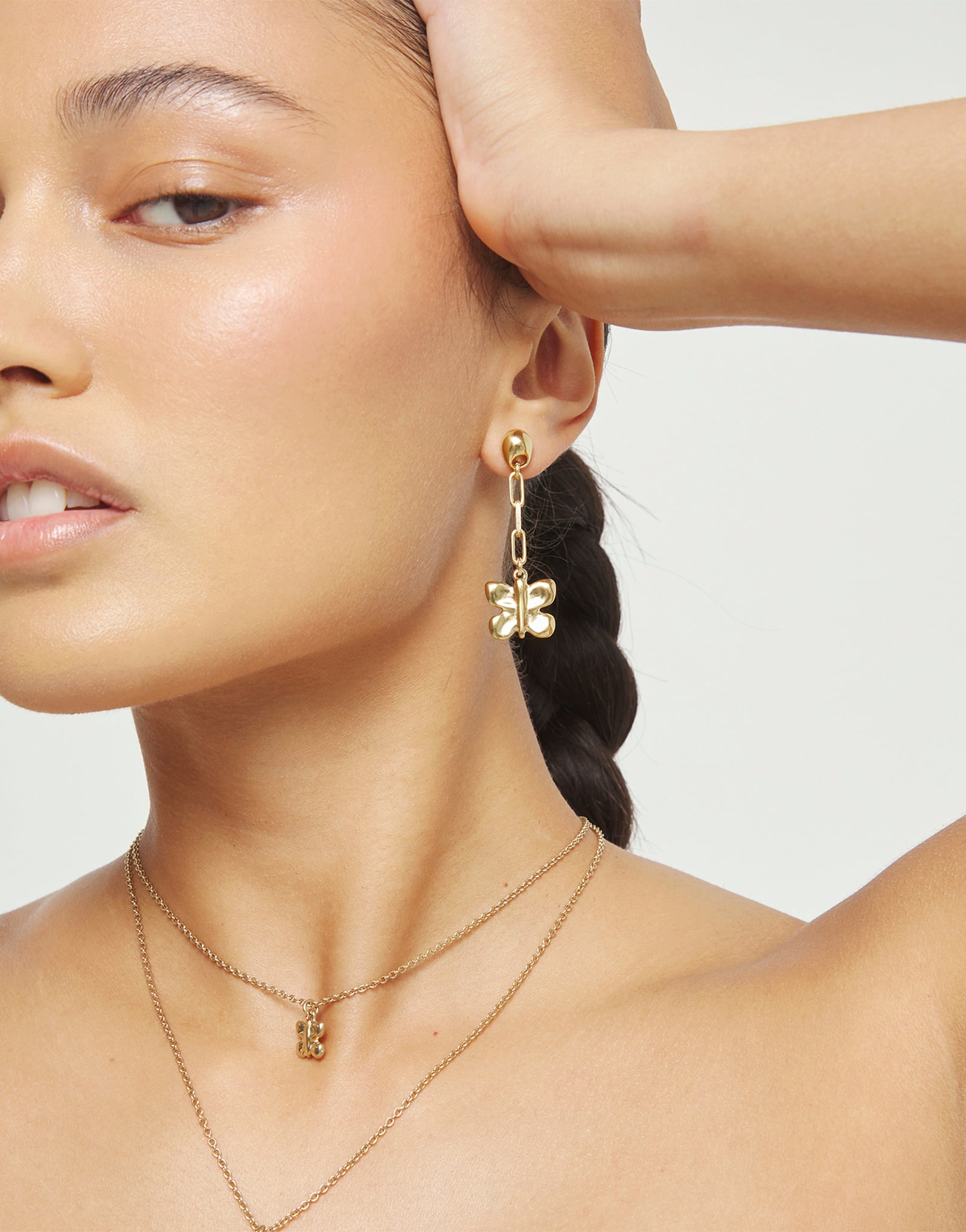 Drop earrings with a butterfly-shaped ornament