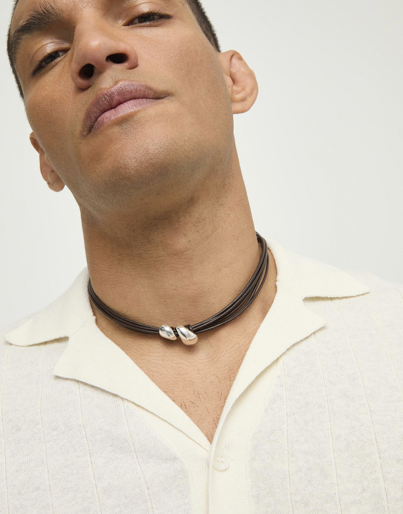 Short leather necklace with two drops