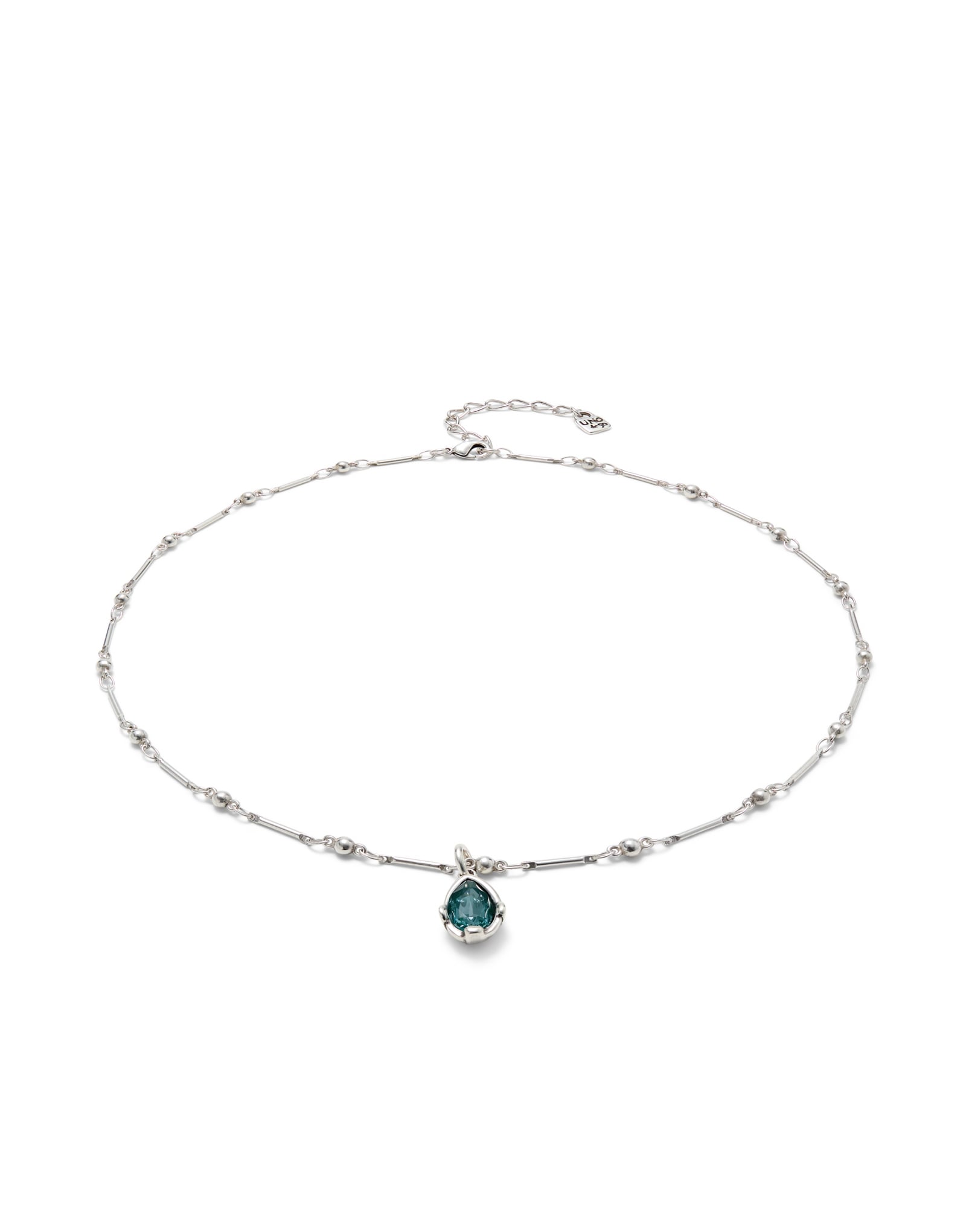 Necklace with a green drop-shaped faceted crystal