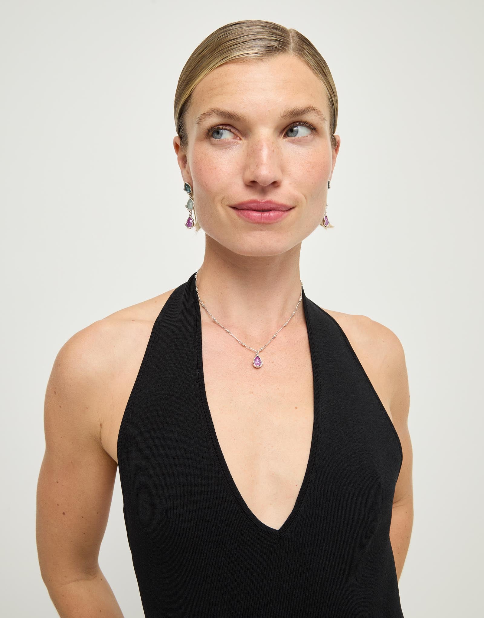Necklace with a pink drop-shaped faceted crystal