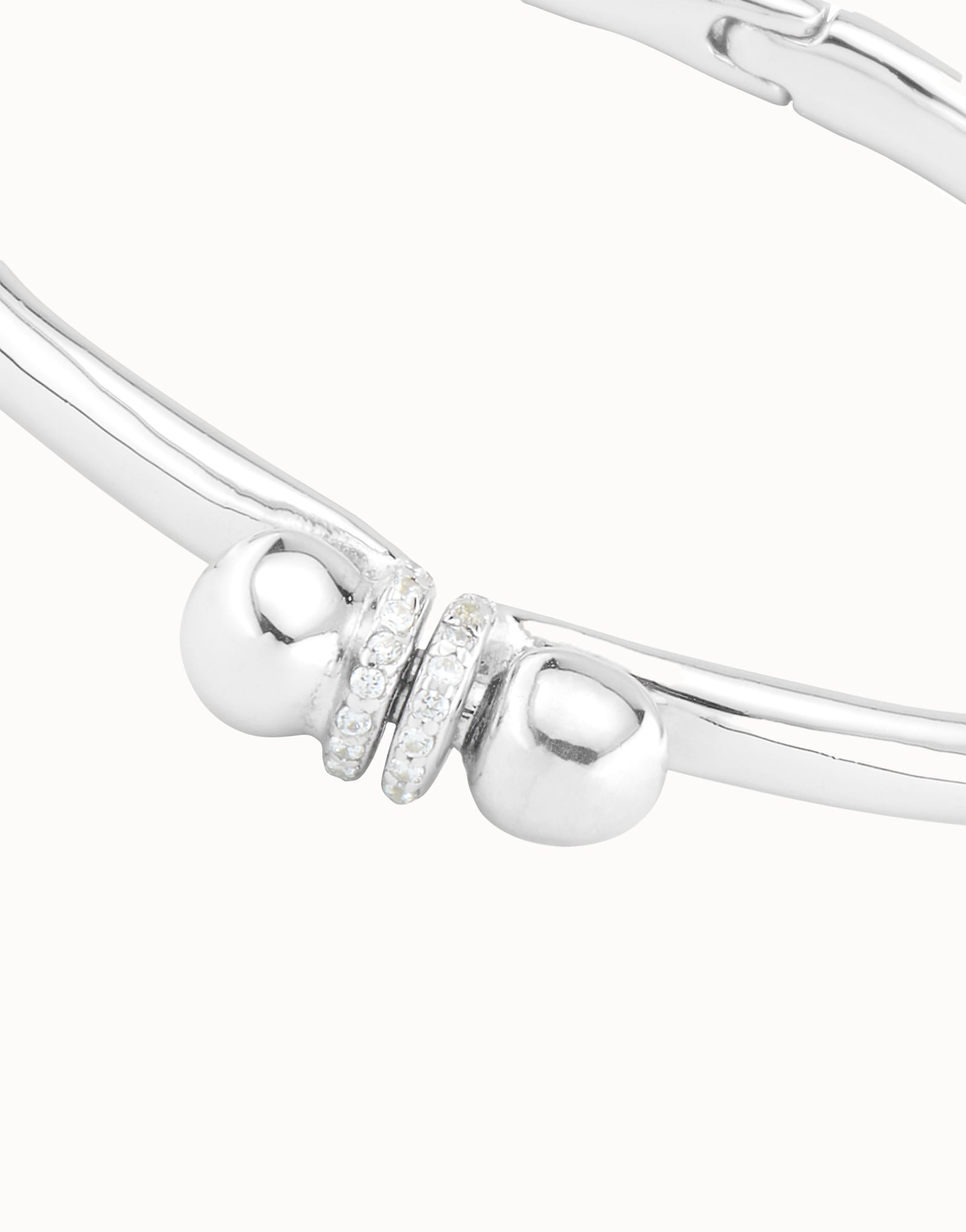 Pulsera r&iacute;gida ba&ntilde;ada en plata con topacios