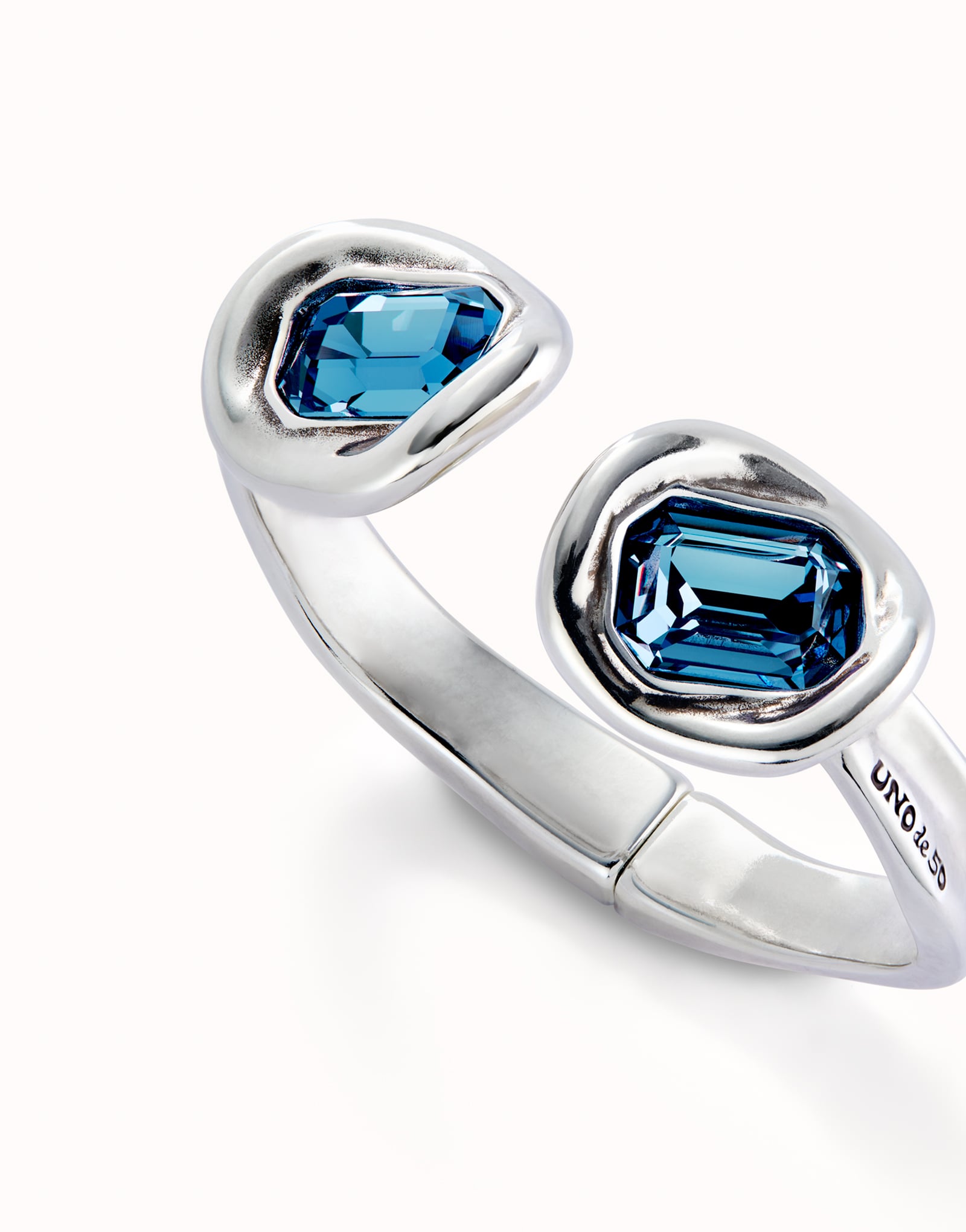 Bangle bracelet with two blue crystals