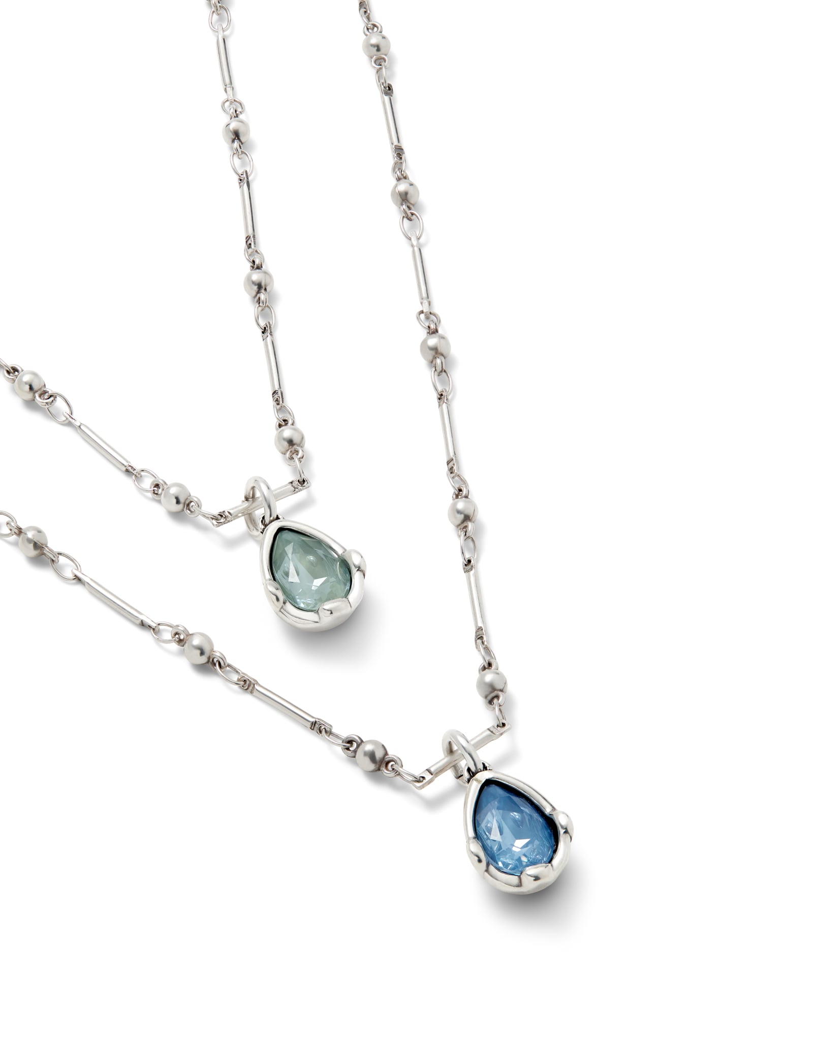 Double necklace with two blue drop-shaped faceted crystals