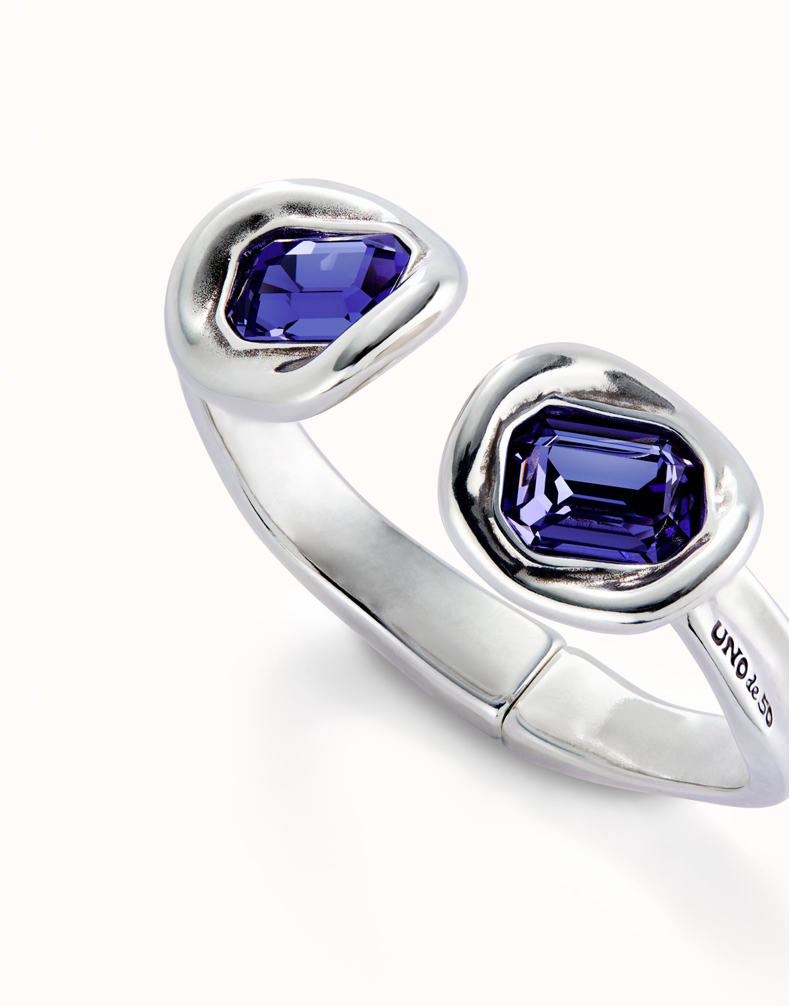 Bangle bracelet with two purple crystals