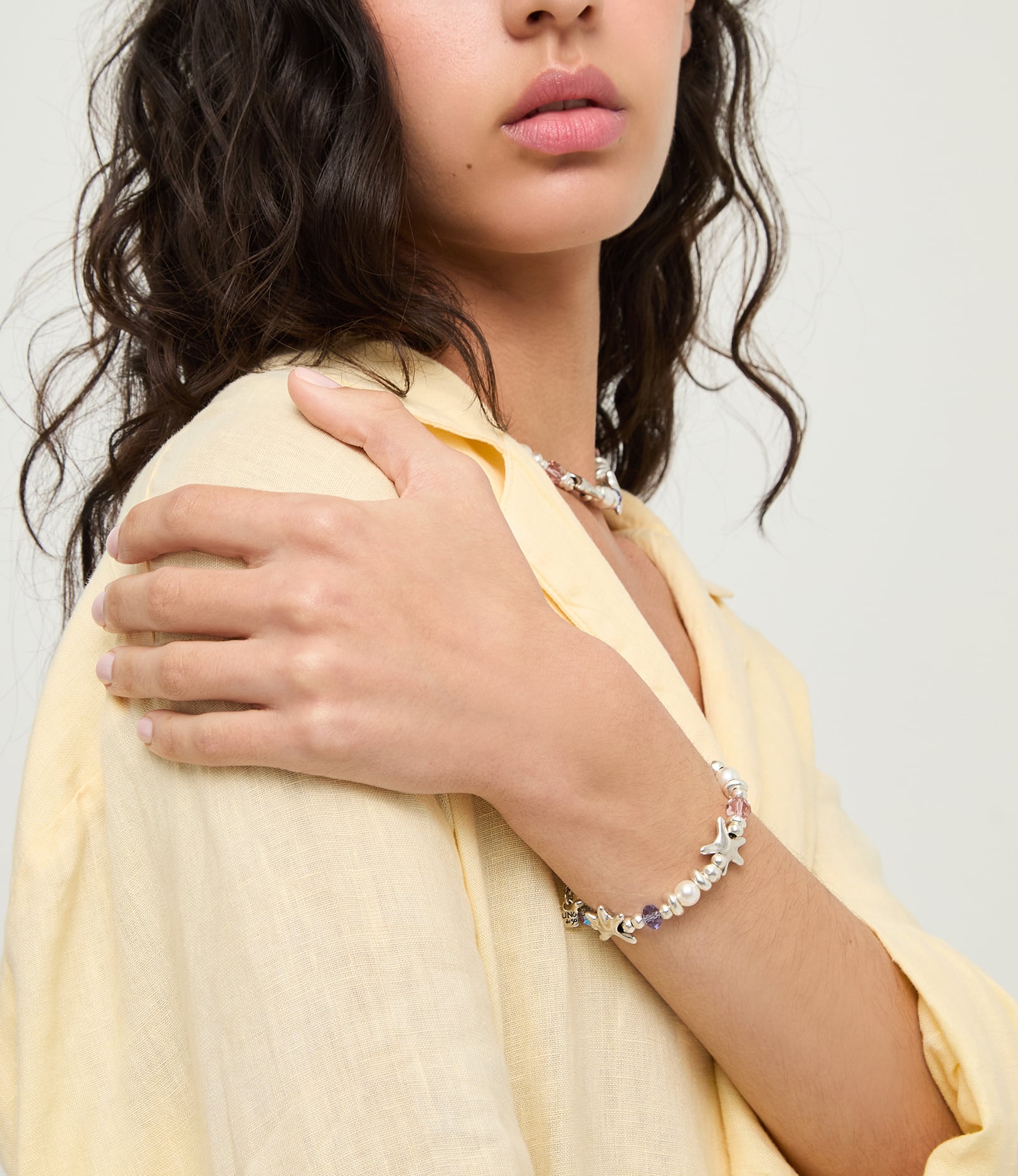 Elastic bracelet with multicolored crystals and starfish