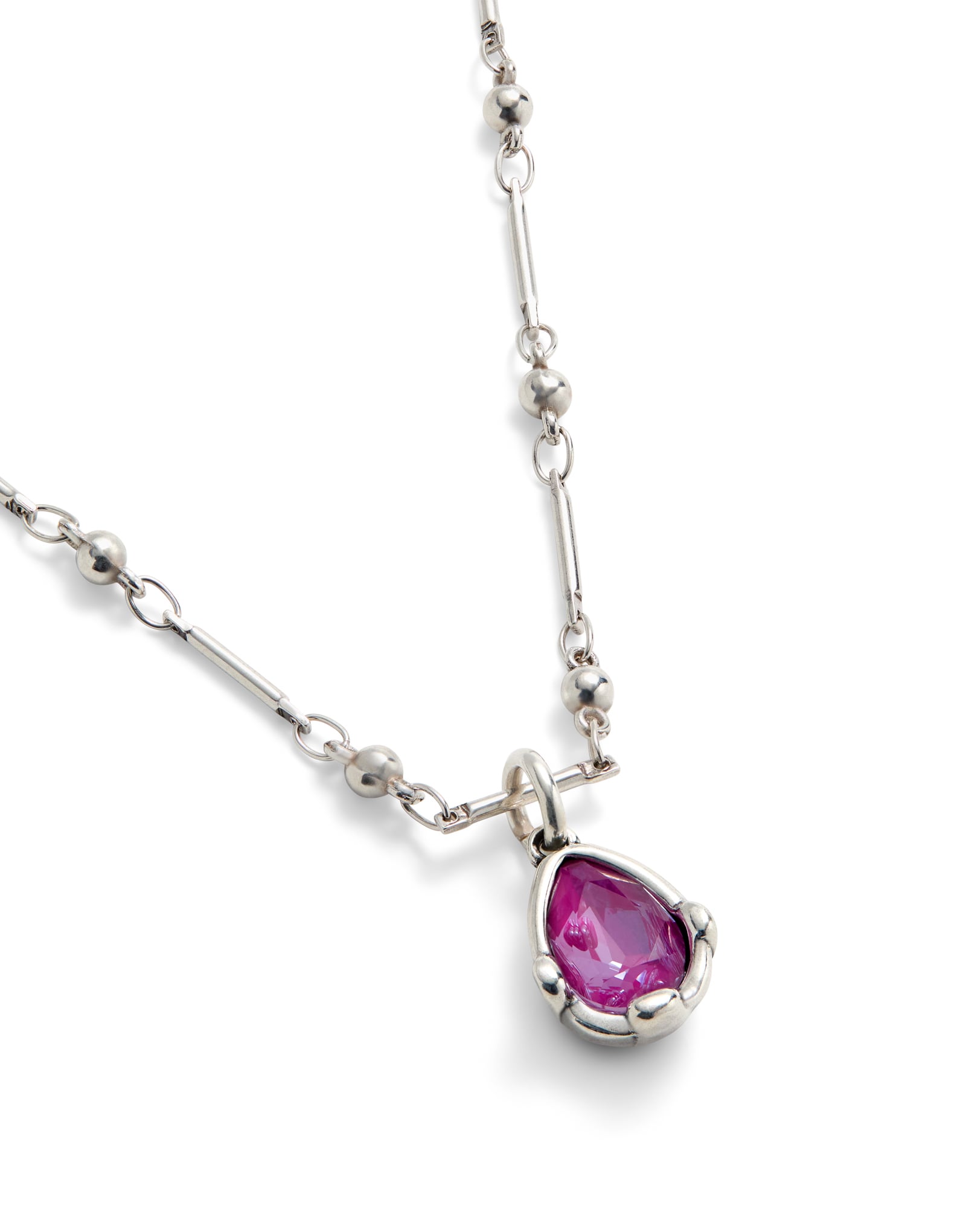 Necklace with a pink drop-shaped faceted crystal