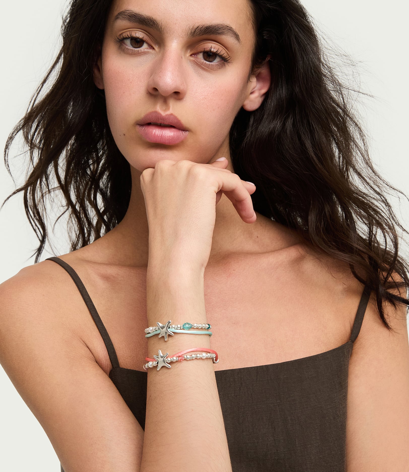 Orange silk thread and metal bracelet with starfish