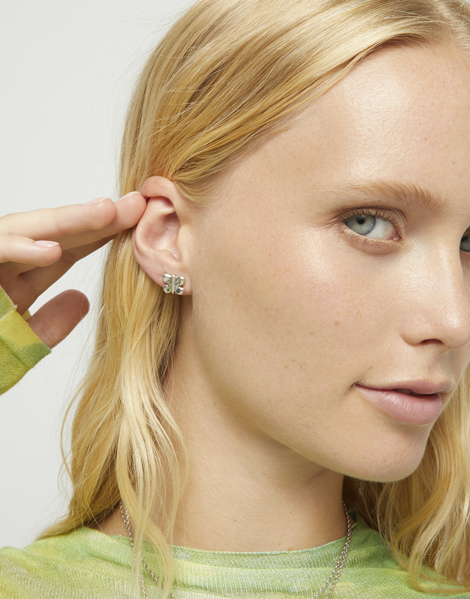 Stud earrings with a butterfly shape