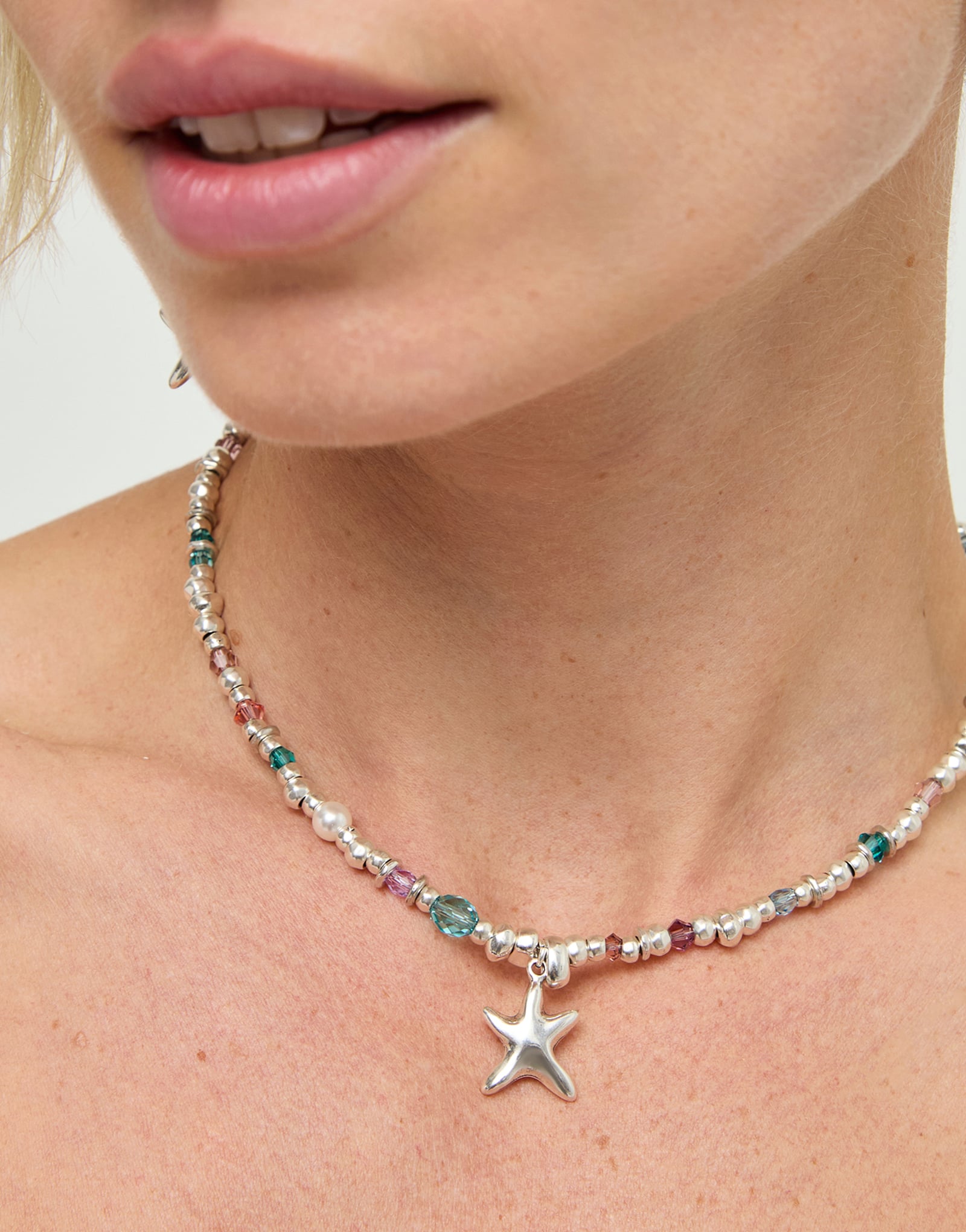 Necklace with crystals and small starfish